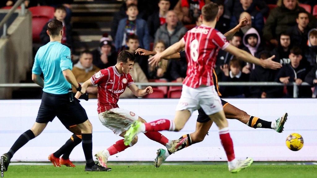 Jason Knight strikes the ball to score the winner for Bristol City