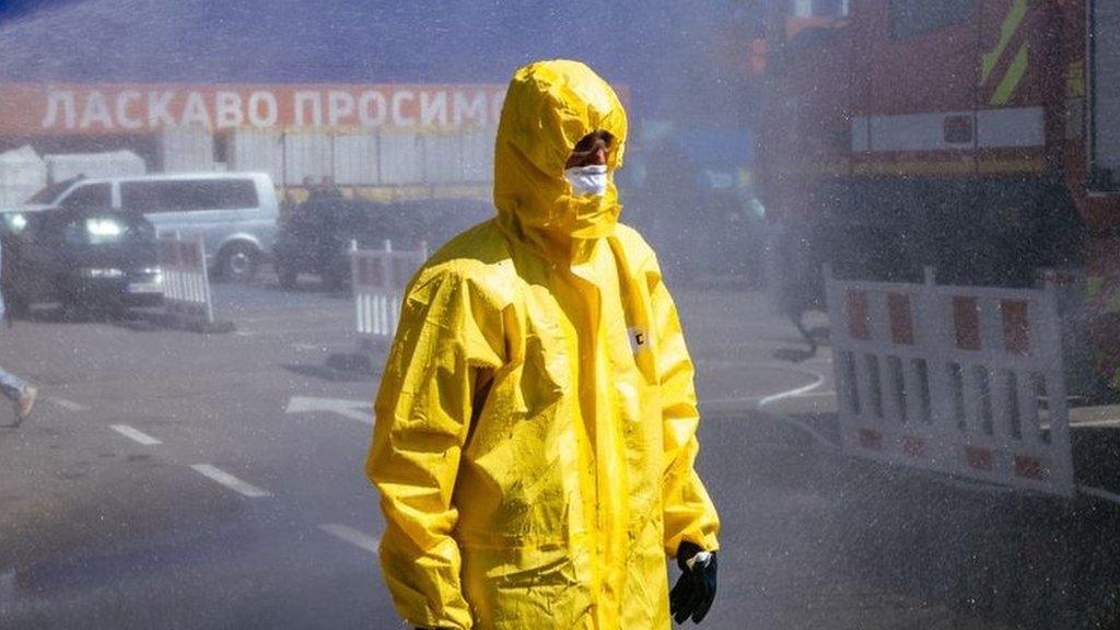 A Ukrainian Emergency Ministry rescuer attends an exercise in the city of Zaporizhzhia on August 17, 2022, in case of a possible nuclear incident at the Zaporizhzhia nuclear power plant located near the city.