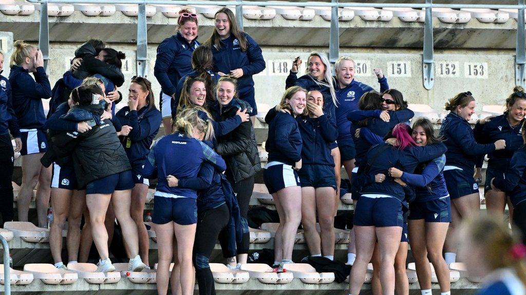 Scotland players celebrate following the WXV2 match between United States and Italy