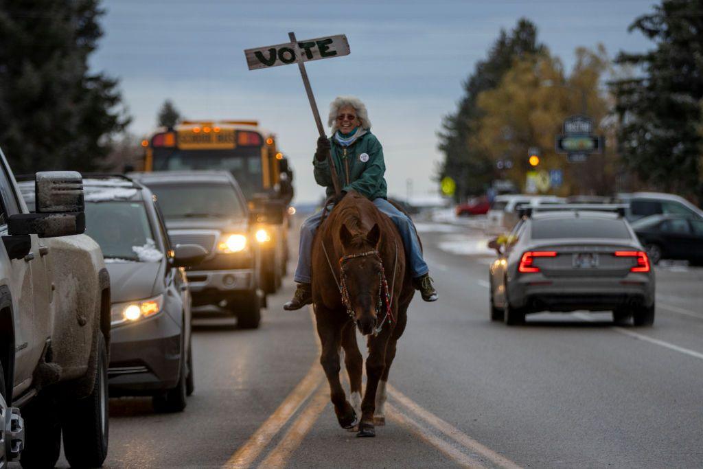 Vancie Tuner and her horse Clementine, beloved residents of Teton County, rally people on Main St. to vote on November 5, 2024 in Driggs, Idaho. 