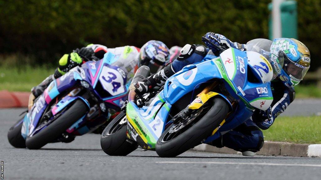 Dean Harrison leads Alastair Seeley at the 2022 North West 200