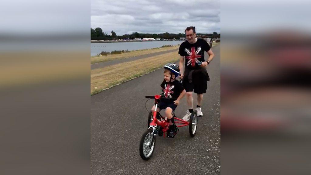 Jack Gray cycling in the disabled triathlon