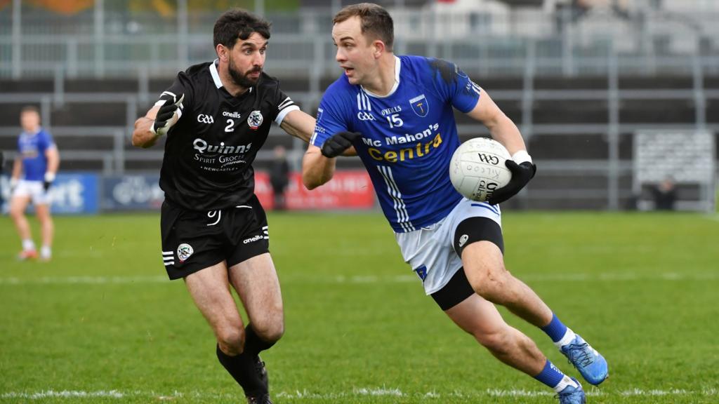 Kilcoo's Niall Branagan attempts to keep pace with Scotstown's Jack McCarron