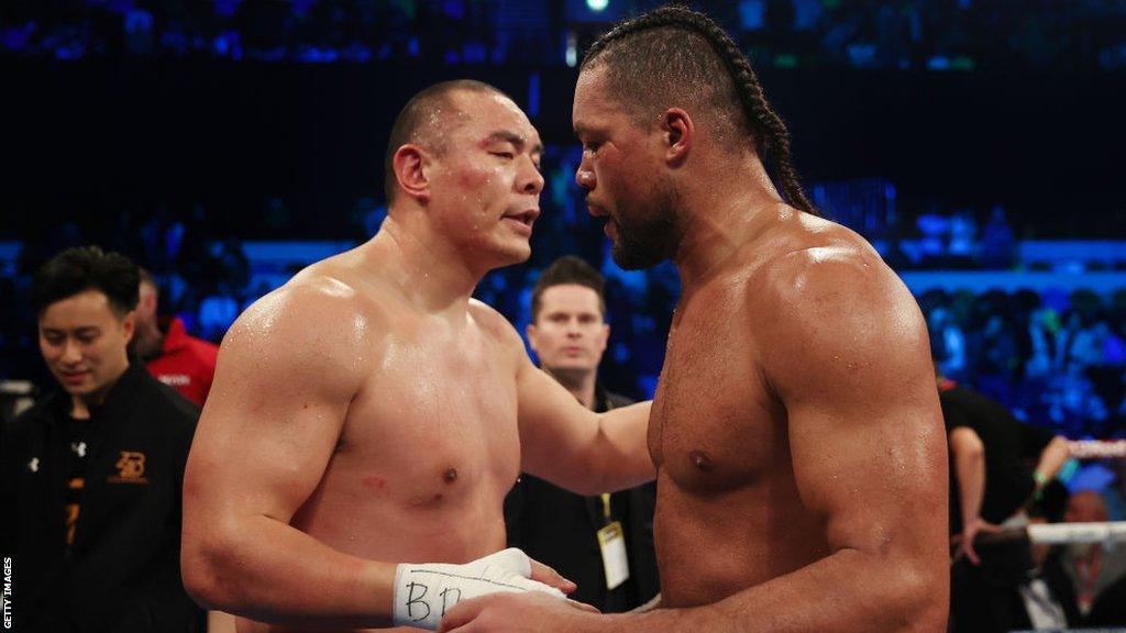 Joe Joyce shakes Zhilei Zhang's hand