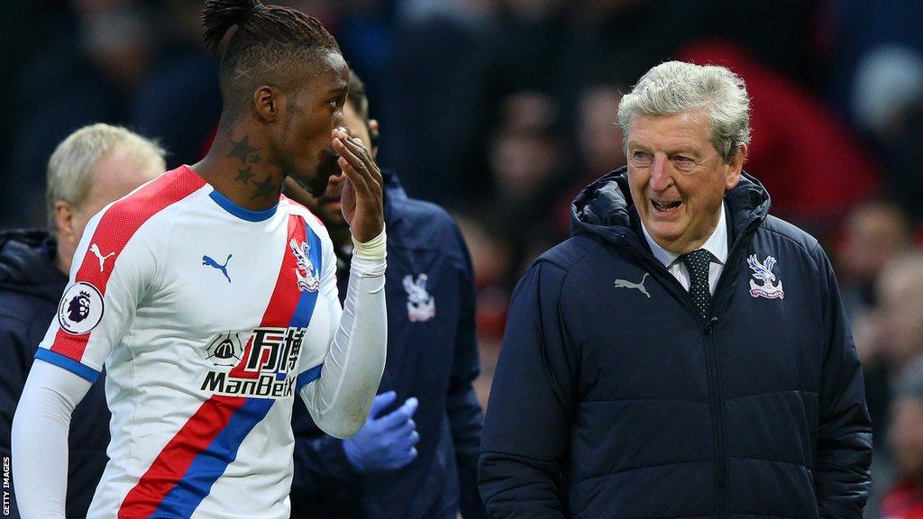 Wilfried Zaha (left) and Roy Hodgson (right)