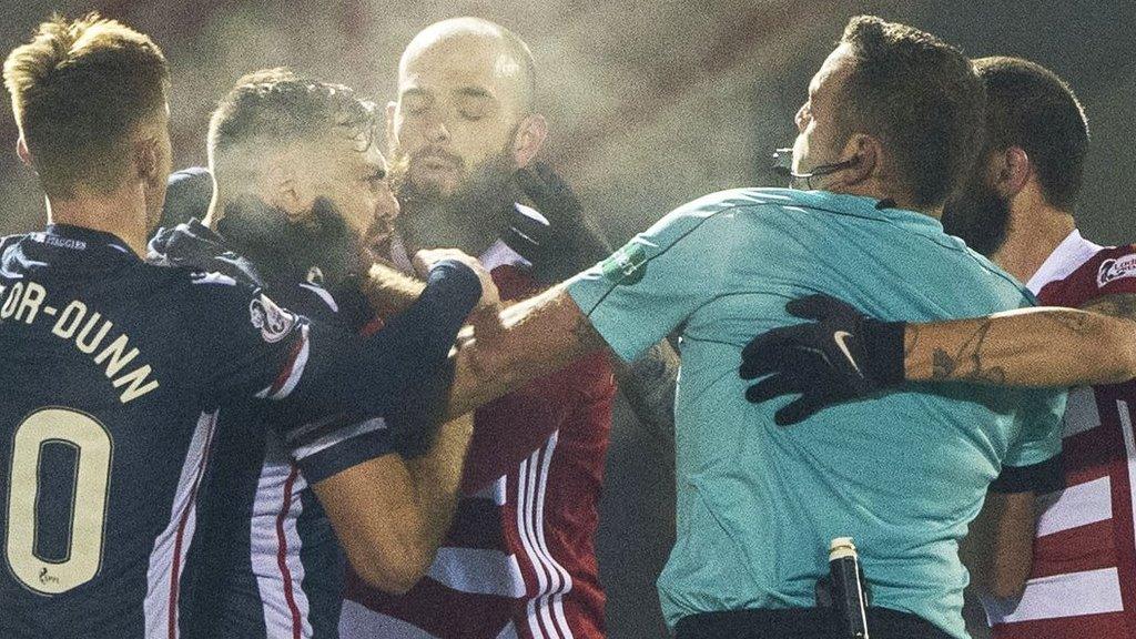 Hamilton and Ross County players clash