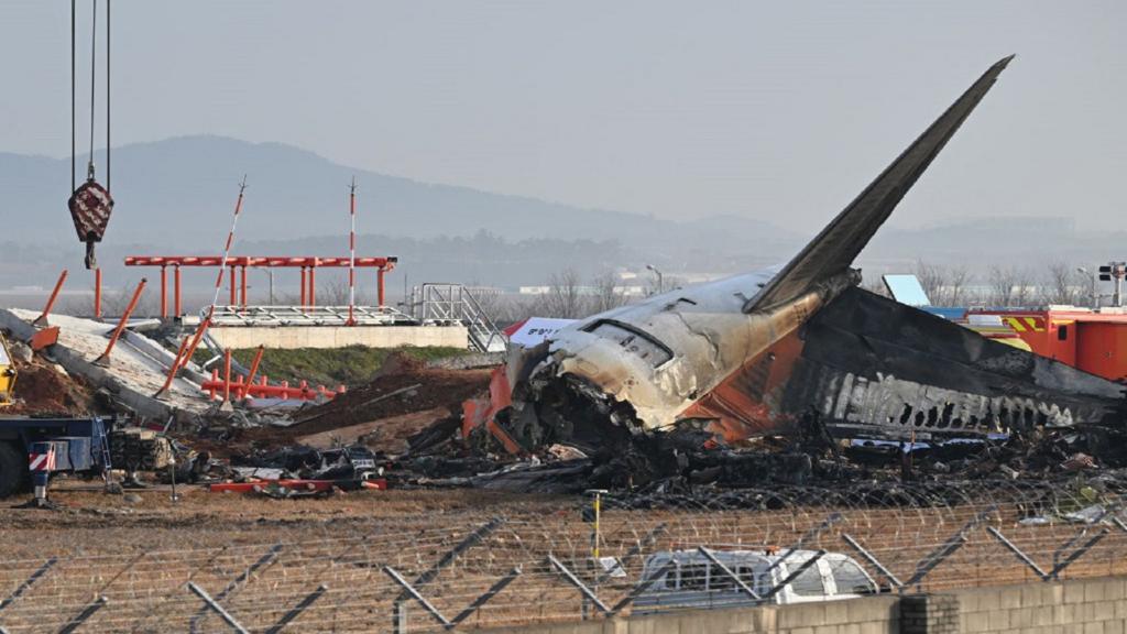 The scene where a Jeju Air Boeing 737-800 series aircraft crashed and burst into flames is seen at Muan International Airport in Muan