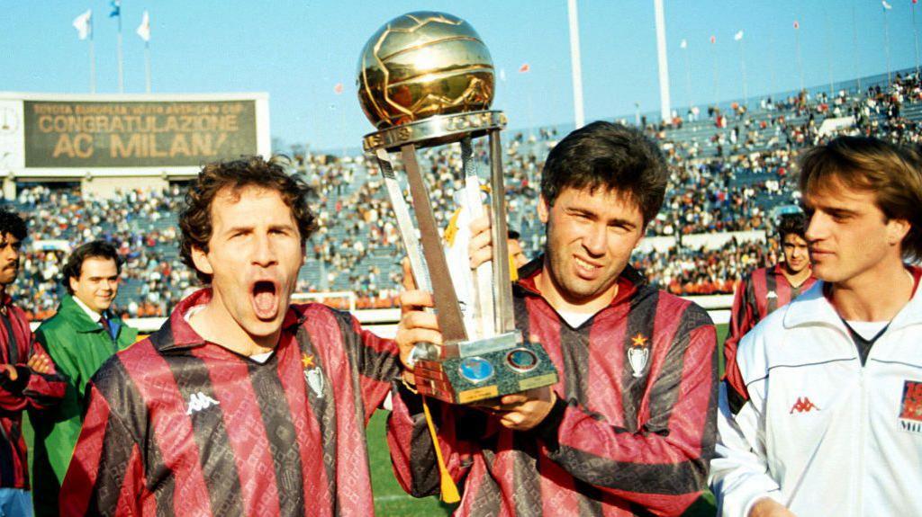 Franco Baresi and Carlo Ancelotti of Milan celebrate the Intercontinental Cup
