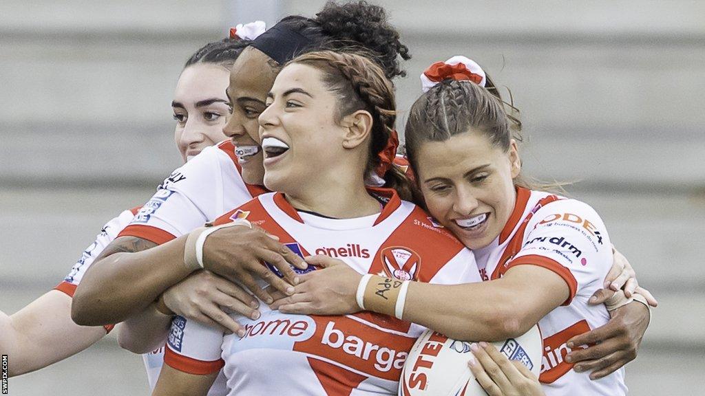 Emily Rudge celebrates one of two tries for St Helens against Leeds