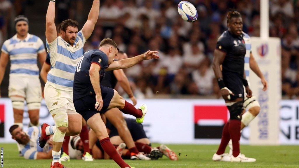 George Ford kicks a drop-goal