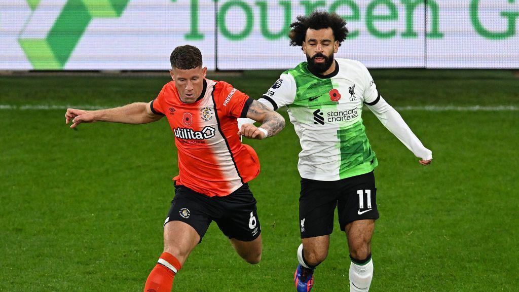 Mohamed Salah of Liverpool with Ross Barkley of Luton during the Premier League match between Luton Town and Liverpool FC