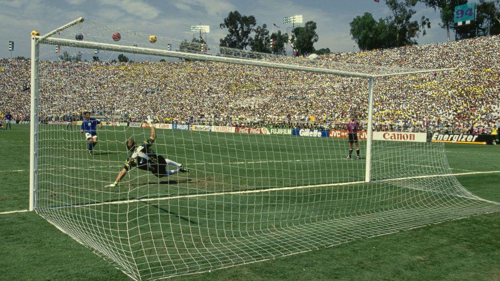 Italy's Roberto Baggio kicks his penalty over the crossbar to hand victory to Brazil in the final of the 1994 World Cup
