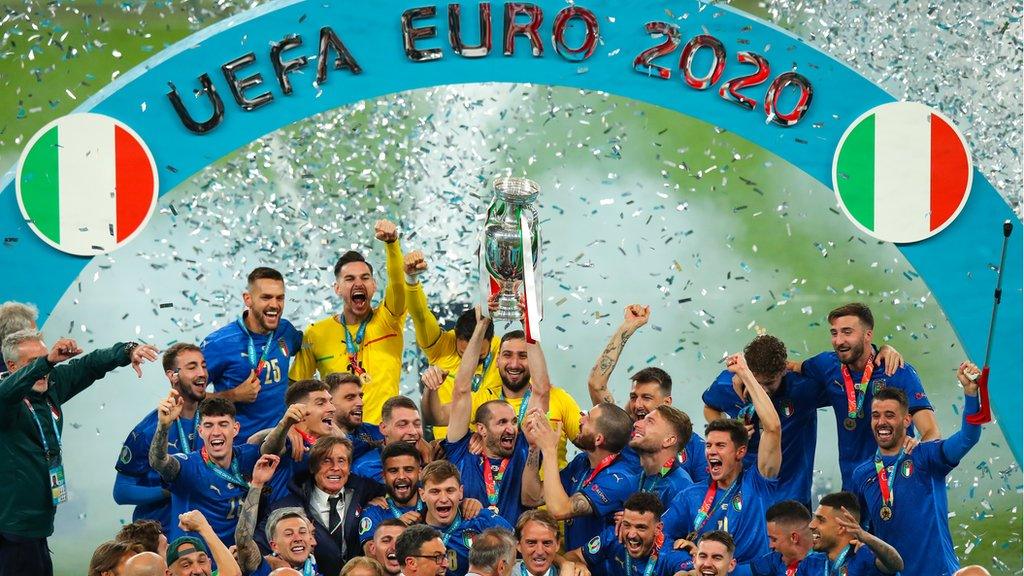 Italy lifting the Euro 2020 trophy at Wembley