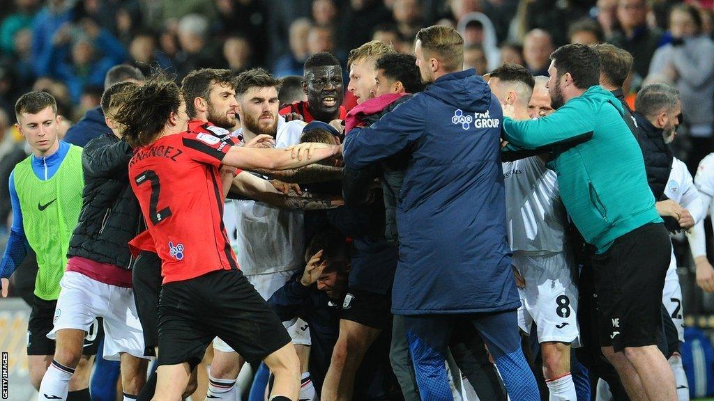 Staff, players and unused substitutes from both clubs were involved in a late brawl