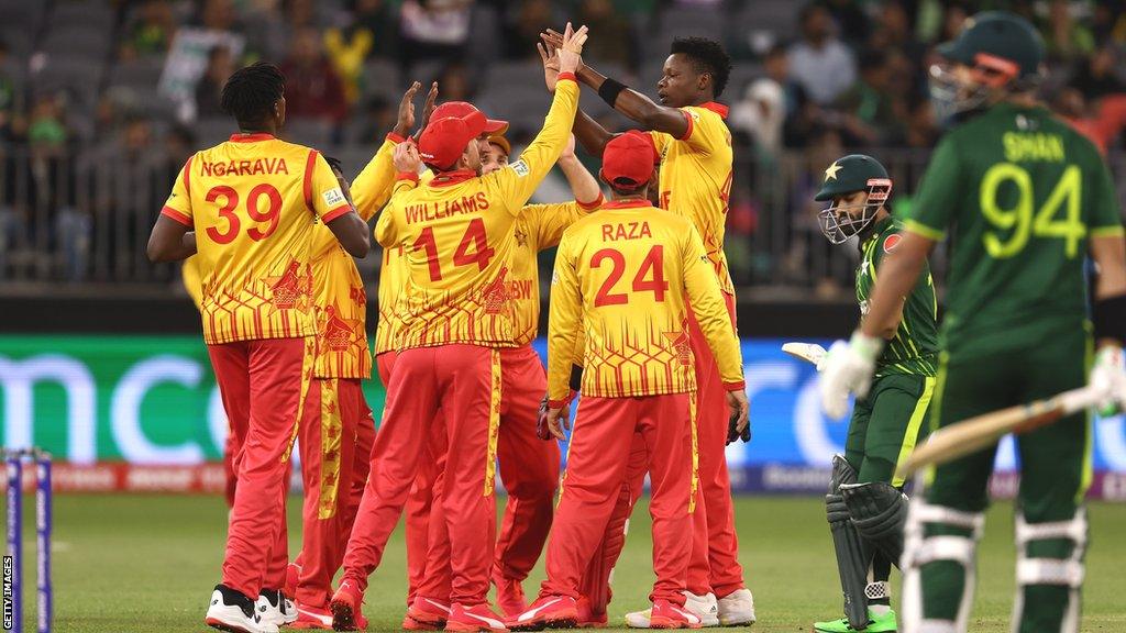 Zimbabwe celebrate the wicket of Mohammad Rizwan (second right)