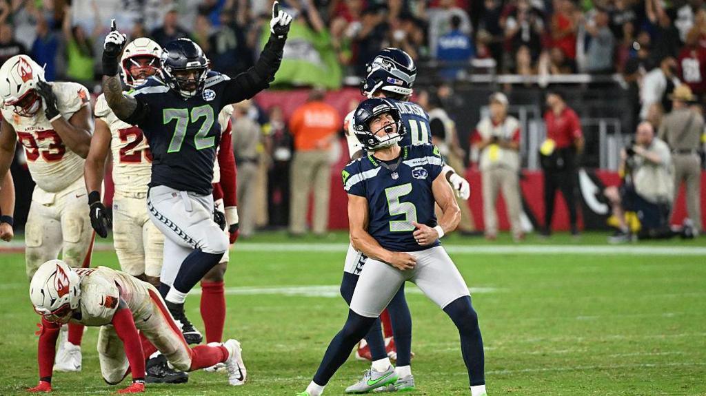Jason Myers celebrates after scoring the game winning field goal for the Seattle Seahawks