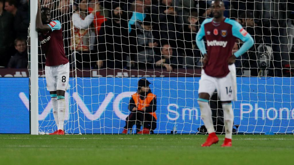 West Ham players looking dejected