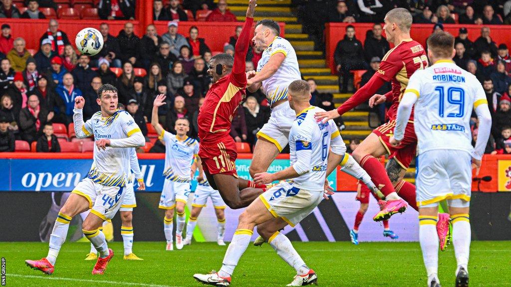 St Johnstone's Andy Considine (centre, above) scores an own goal but Aberdeen's Luis Lopes is ruled offside after a VAR check during a cinch Premiership match between Aberdeen and St Johnstone at Pittodrie Stadium