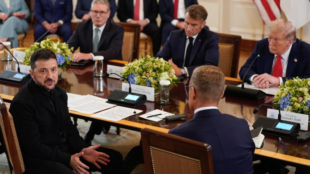 Ukrainian President Volodymyr Zelenskiy speaks during a meeting with U.S. President Donald Trump, French President Emmanuel Macron, British Prime Minister Keir Starmer, and Finland's President Alexander Stubb 