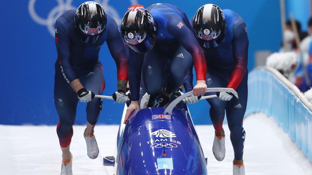 Brad Hall, Taylor Lawrence, Nick Gleeson and Greg Cackett of Team Great Britain slide during the four-man Bobsleigh heats in Beijing