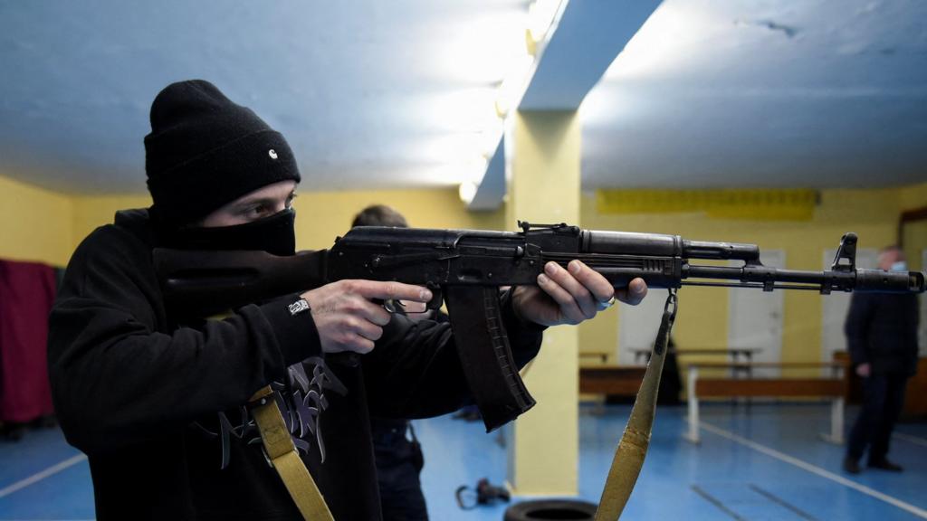 A civilian who volunteered to join the Territorial Defence Forces trains on weapons, following Russia"s invasion of Ukraine, in Odesa