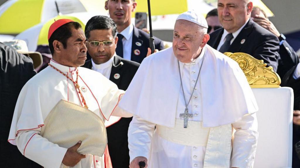 Pope Francis attends a mass at the Esplanade of Tasitolu in Dili, East Timor, on September 10, 2024