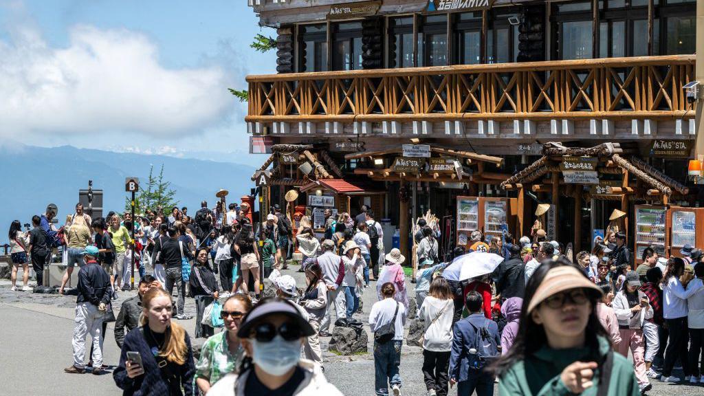 Japanese tourists on Fuji