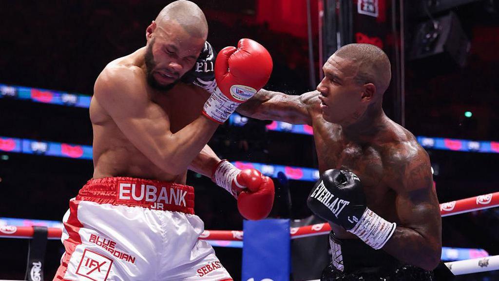 Conor Benn lands a right on Chris Eubank Jr