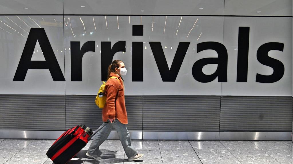 A traveller at Heathrow airport