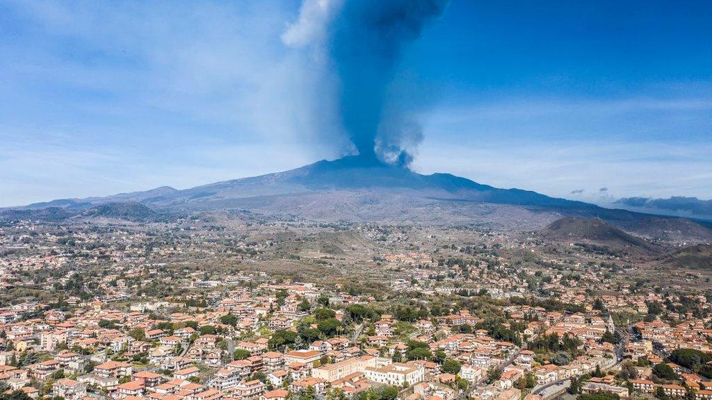 Mount Etna erupting, seen during the daytime