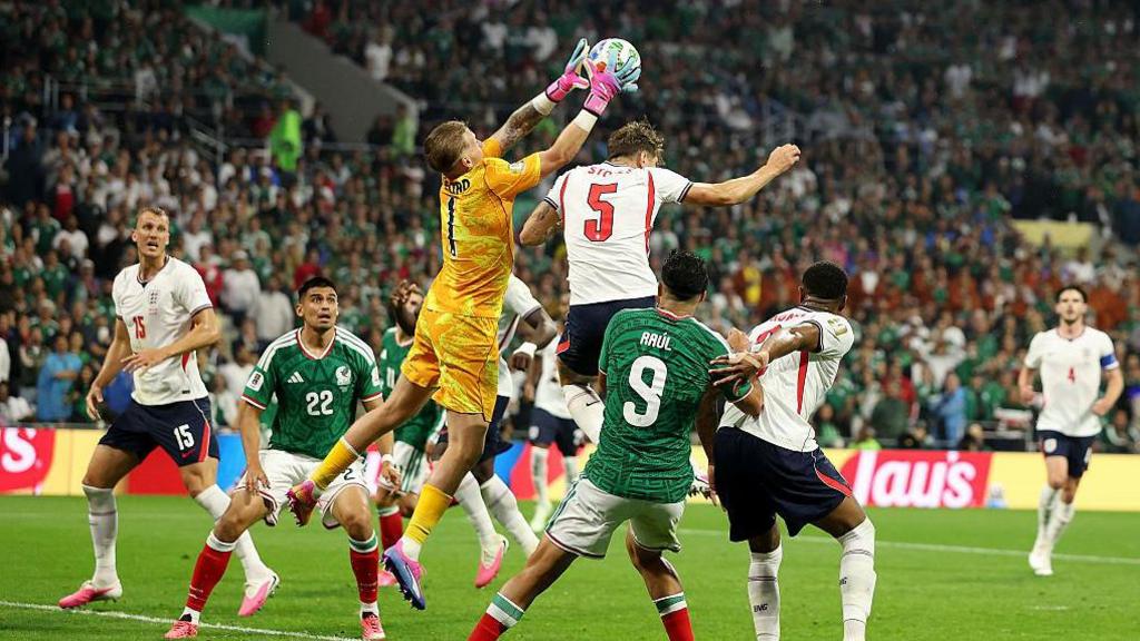 Jordan Pickford makes a save during the match between Mexico and England at Mexico City Stadium.