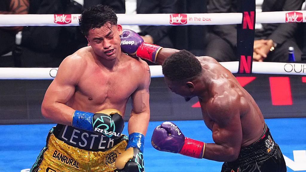 Christian Mbilli punches Lester Martinez