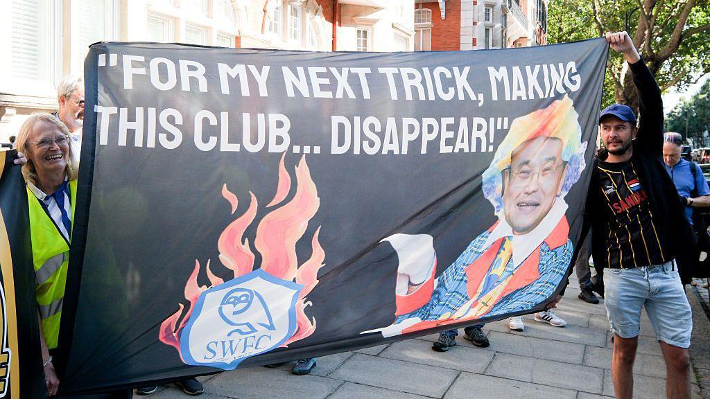 Sheffield Wednesday fans protesting against owner Dejphon Chansiri outside the Thai Embassy in London