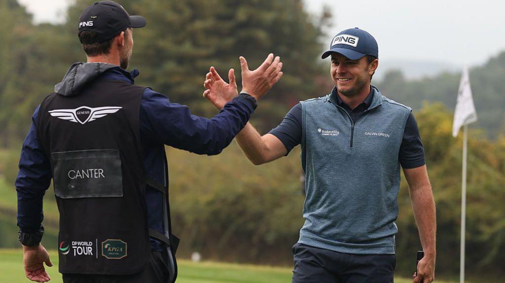Laurie Canter celebrates holing a putt at the Genesis Championship in South Korea