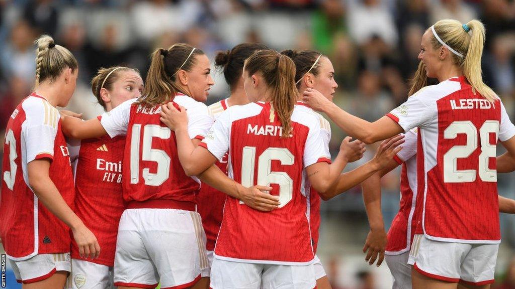 Arsenal's players celebrate scoring