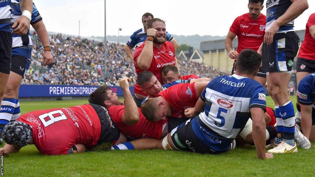 Jersey Reds celebrate Alun Lawrence's try