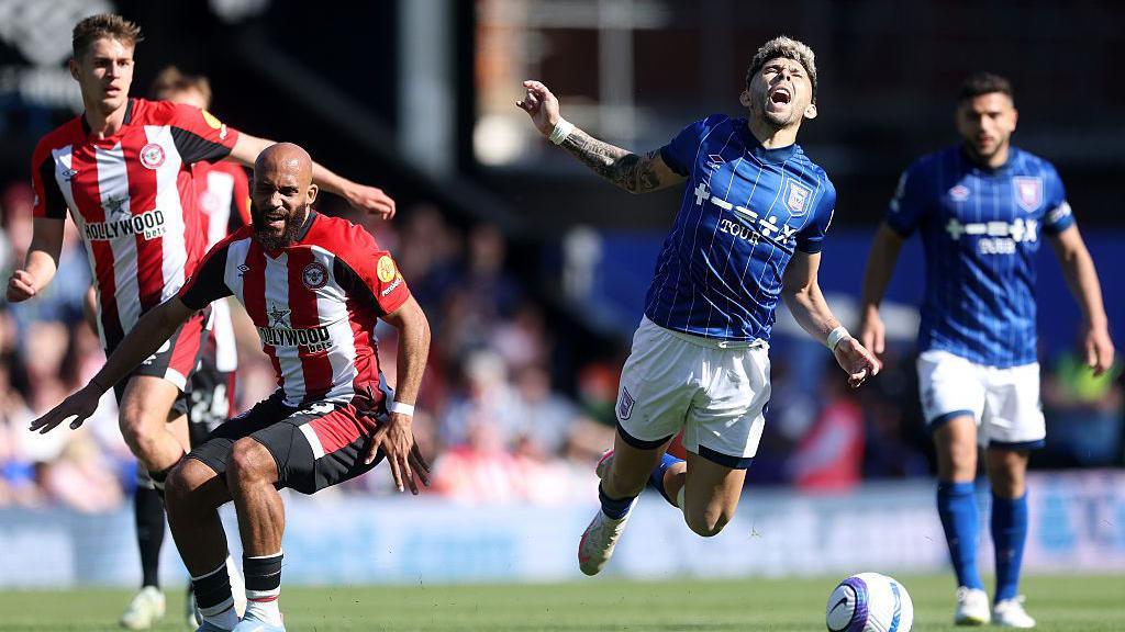 Julio Enciso goes to ground under pressure from Bryan Mbeumo during Ipswich's Premier League defeat at home to Brentford