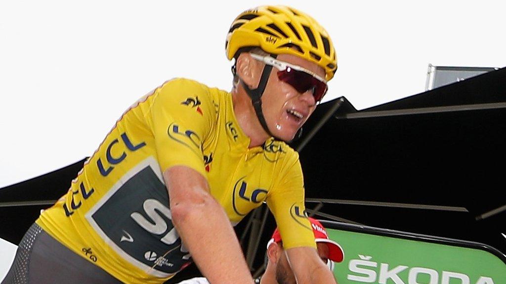 An exhausted Chris Froome crosses the line on THursday