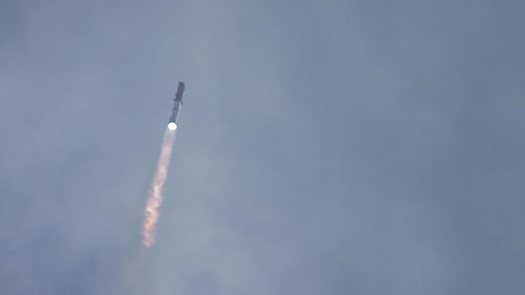 A shot showing the SpaceX rocket taking off