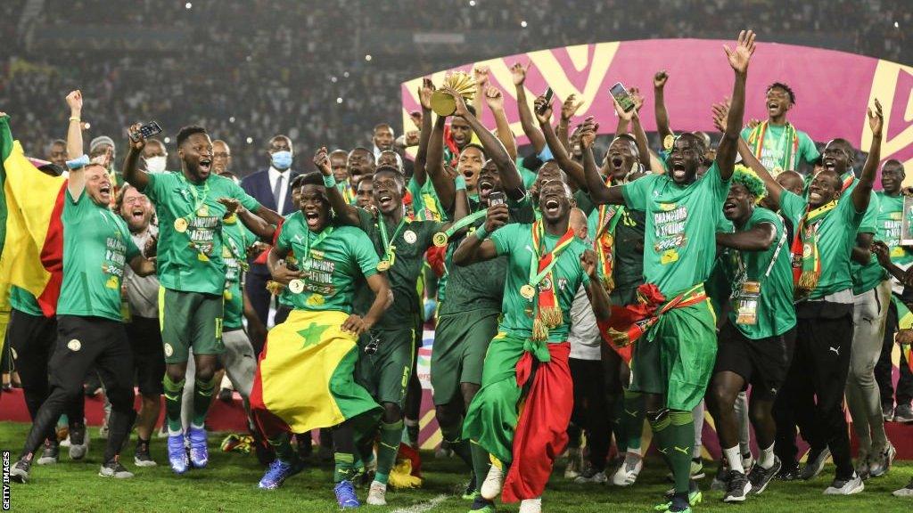 The Senegal football team celebrate winning the African Cup of Nations