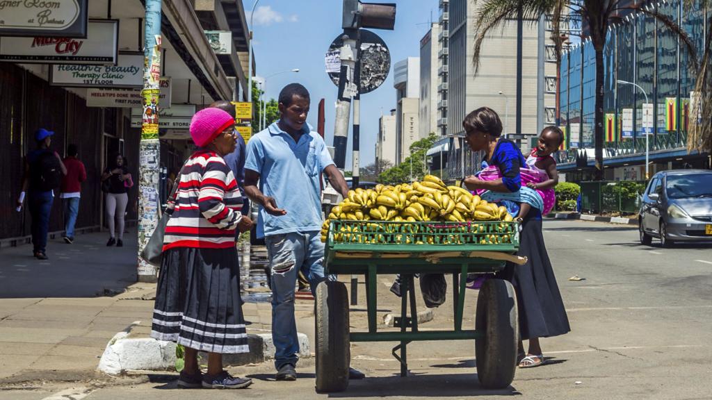 People buying bananas in Harare, Zimbabwe - 2017