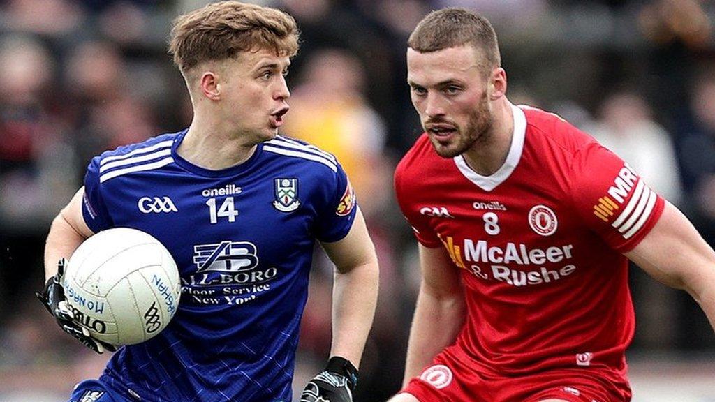 Monaghan's Karl Gallagher attempts to get past Tyrone's Brian Kennedy