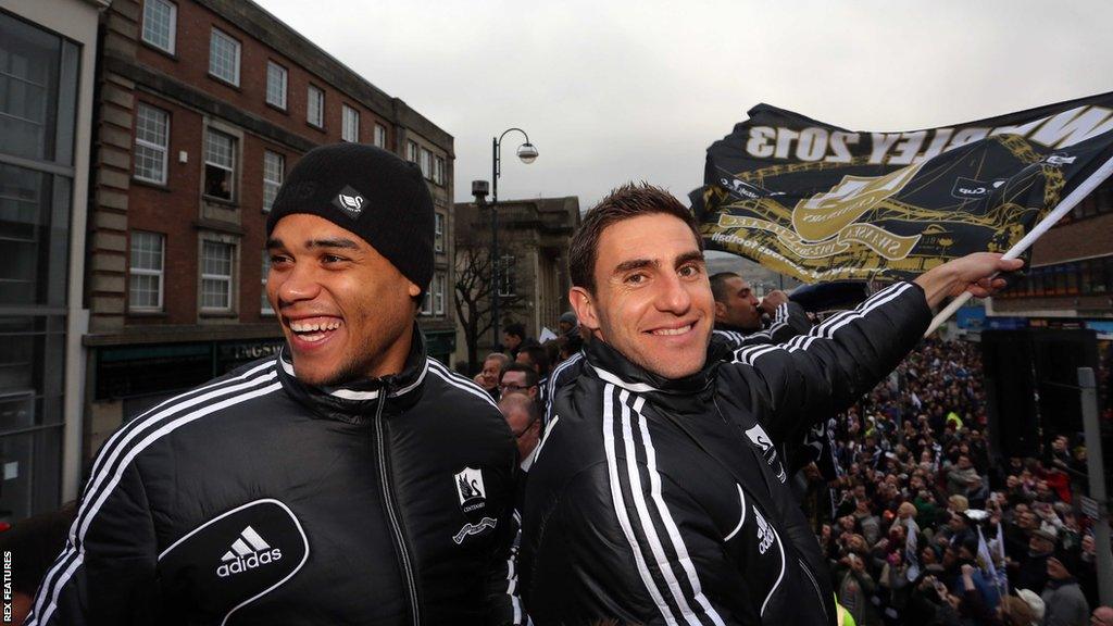 Michel Vorm and Angel Rangel on Swansea's Capital One Cup winners' bus parade