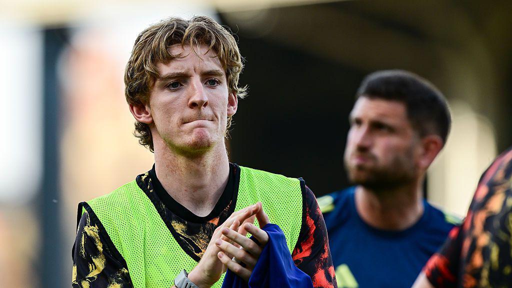 Anthony Gordon applauds Newcastle United supporters after the game against Fulham on 24 May 2026