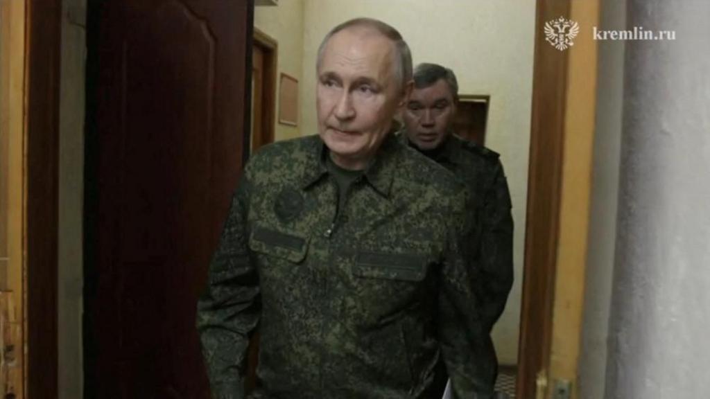 Russian President Vladimir Putin walks ahead of Chief of the General Staff of Russian Armed Forces Valery Gerasimov as he visits the army command centre in the course of Russia-Ukraine conflict in the Kursk region, Russia, March 12, 2025, in this still image taken from video.