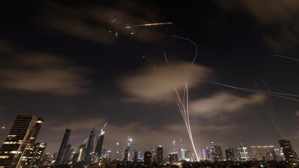 Missiles launched from Iran are intercepted as seen from Tel Aviv, Israel, June 18, 2025. 