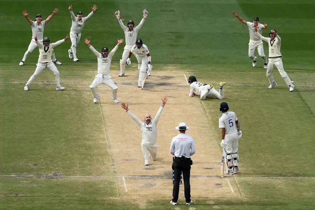 Nathan Lyon celebrates after trapping Mohammed Siraj lbw as Australia won the match during day five of the Men's Fourth Test Match in the series between Australia and India at Melbourne Cricket Ground on December 30, 2024 in Melbourne, Australia. 