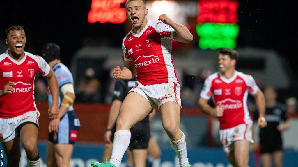 Mikey Lewis leaps in the air after scoring for Hull KR versus Saints