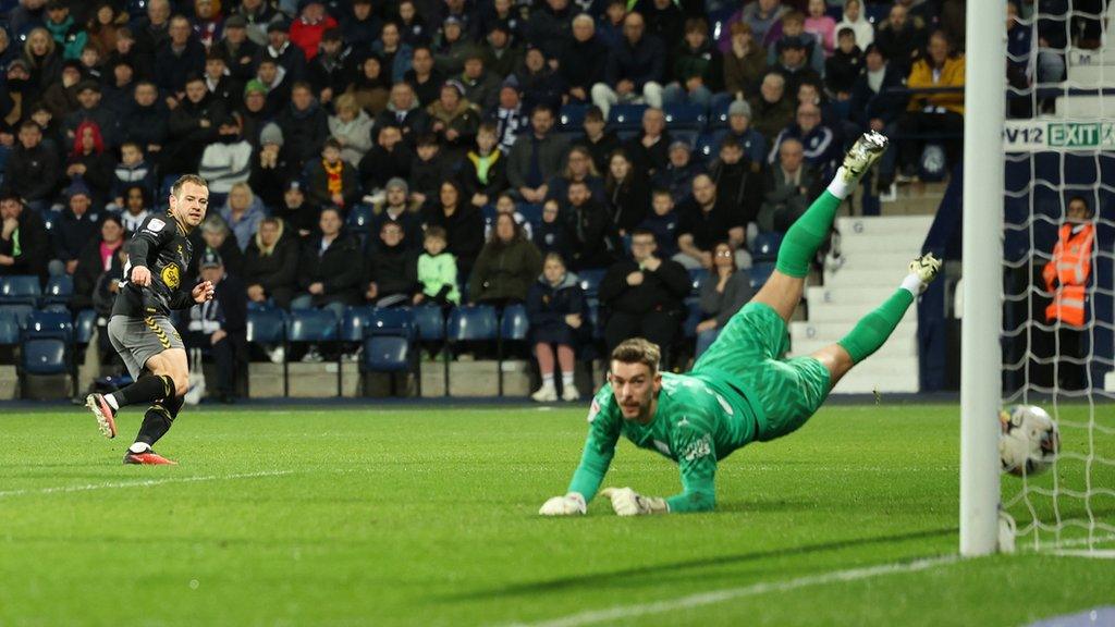 Ryan Fraser steers his right-foot volley past Alex Palmer