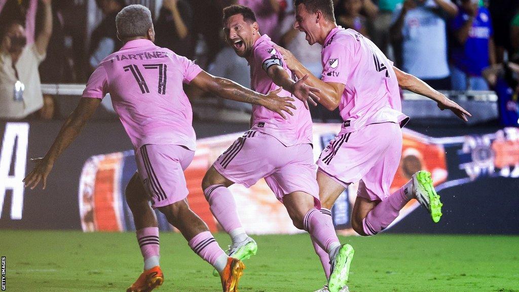 Lionel Messi celebrates scoring the winner for Inter Miami